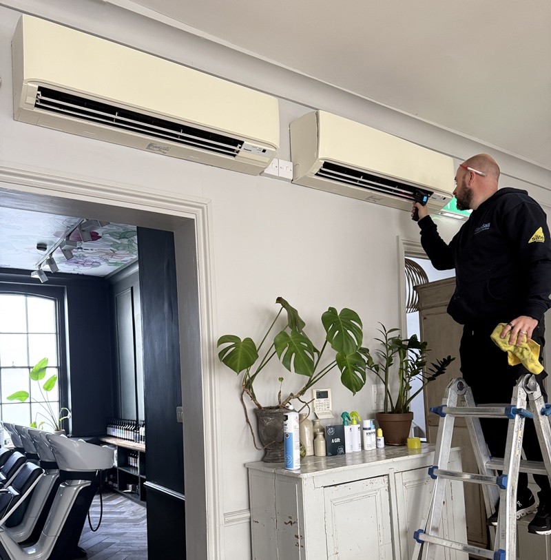 Air conditioning unit being fitted in office