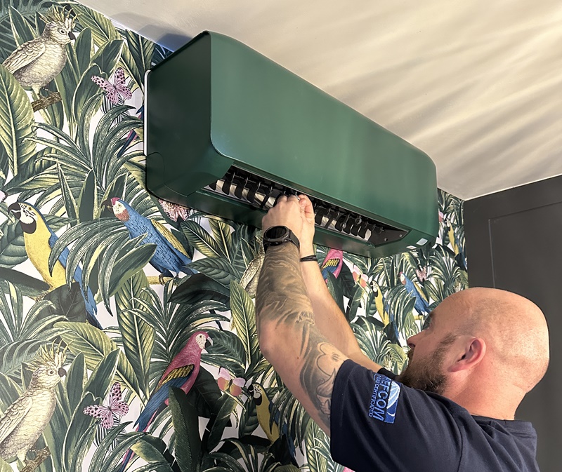 Air conditioning unit being installed by Kendall Mechanical
