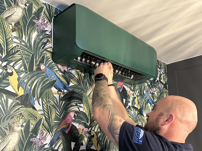 Colour matched AC Unit being installed